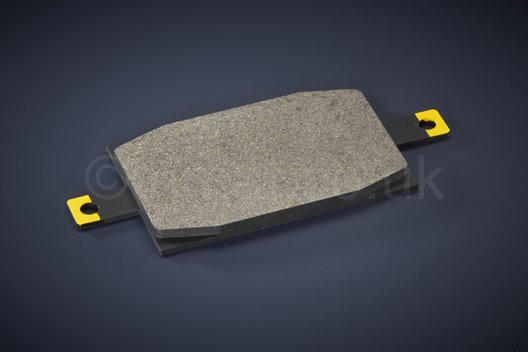 molded press blocks, molded friction rings, non-metallic friction materials, molded brake pads, over molded brake parts